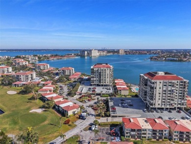 Yes, that really is the view from this unit! Balmy bay breezes on Isla Del Sol Yacht and Country Club in Florida - for sale on GolfHomes.com, golf home, golf lot