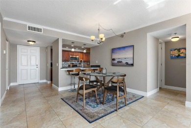 Yes, that really is the view from this unit! Balmy bay breezes on Isla Del Sol Yacht and Country Club in Florida - for sale on GolfHomes.com, golf home, golf lot