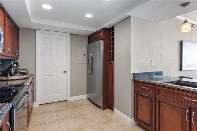 Yes, that really is the view from this unit! Balmy bay breezes on Isla Del Sol Yacht and Country Club in Florida - for sale on GolfHomes.com, golf home, golf lot