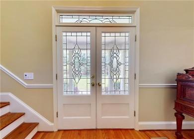 Imagine mornings on your spacious covered front porch or on Okefenokee Country Club in Georgia - for sale on GolfHomes.com, golf home, golf lot