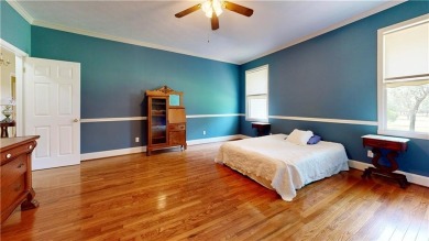 Imagine mornings on your spacious covered front porch or on Okefenokee Country Club in Georgia - for sale on GolfHomes.com, golf home, golf lot