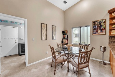 Enjoy the lifestyle of country club living in the friendly on Woodmont Country Club in Florida - for sale on GolfHomes.com, golf home, golf lot