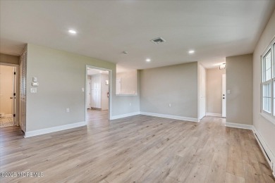 Beautiful end unit features custom eat in kitchen with quartz on Leisure Village East in New Jersey - for sale on GolfHomes.com, golf home, golf lot