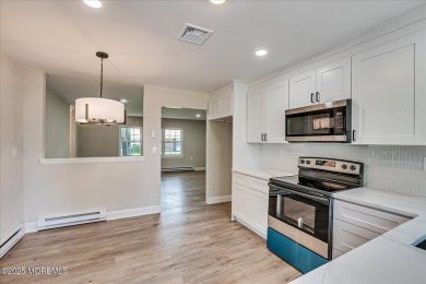 Beautiful end unit features custom eat in kitchen with quartz on Leisure Village East in New Jersey - for sale on GolfHomes.com, golf home, golf lot