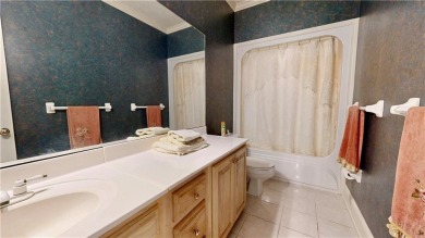 Imagine mornings on your spacious covered front porch or on Okefenokee Country Club in Georgia - for sale on GolfHomes.com, golf home, golf lot