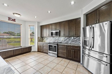 This impeccably Willow model offers 4 bedrooms plus a loft and 3 on Winston Trails Golf Course in Florida - for sale on GolfHomes.com, golf home, golf lot