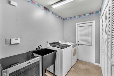 Enjoy the lifestyle of country club living in the friendly on Woodmont Country Club in Florida - for sale on GolfHomes.com, golf home, golf lot