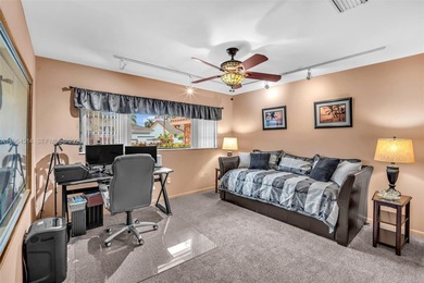 Enjoy the lifestyle of country club living in the friendly on Woodmont Country Club in Florida - for sale on GolfHomes.com, golf home, golf lot