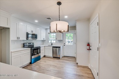 Beautiful end unit features custom eat in kitchen with quartz on Leisure Village East in New Jersey - for sale on GolfHomes.com, golf home, golf lot