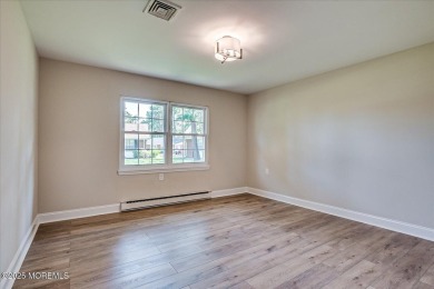 Beautiful end unit features custom eat in kitchen with quartz on Leisure Village East in New Jersey - for sale on GolfHomes.com, golf home, golf lot