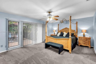 Enjoy the lifestyle of country club living in the friendly on Woodmont Country Club in Florida - for sale on GolfHomes.com, golf home, golf lot