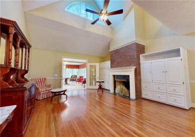 Imagine mornings on your spacious covered front porch or on Okefenokee Country Club in Georgia - for sale on GolfHomes.com, golf home, golf lot