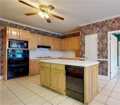 Imagine mornings on your spacious covered front porch or on Okefenokee Country Club in Georgia - for sale on GolfHomes.com, golf home, golf lot