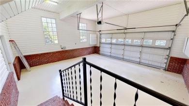 Imagine mornings on your spacious covered front porch or on Okefenokee Country Club in Georgia - for sale on GolfHomes.com, golf home, golf lot