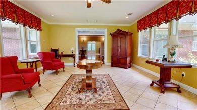 Imagine mornings on your spacious covered front porch or on Okefenokee Country Club in Georgia - for sale on GolfHomes.com, golf home, golf lot