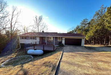 Don't miss this newly remodeled, spacious home! Updates include on The Course At Turkey Mountain in Arkansas - for sale on GolfHomes.com, golf home, golf lot