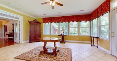 Imagine mornings on your spacious covered front porch or on Okefenokee Country Club in Georgia - for sale on GolfHomes.com, golf home, golf lot