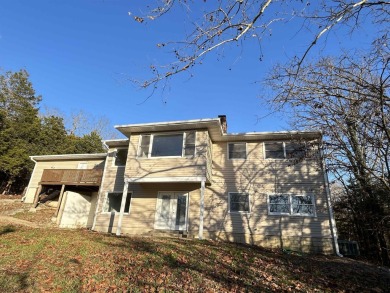 Don't miss this newly remodeled, spacious home! Updates include on The Course At Turkey Mountain in Arkansas - for sale on GolfHomes.com, golf home, golf lot