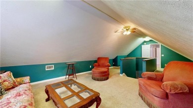 Imagine mornings on your spacious covered front porch or on Okefenokee Country Club in Georgia - for sale on GolfHomes.com, golf home, golf lot