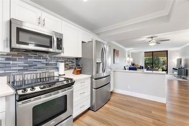 You'll fall in love with this move-in ready & beautifully on Hillsboro Pines Golf in Florida - for sale on GolfHomes.com, golf home, golf lot