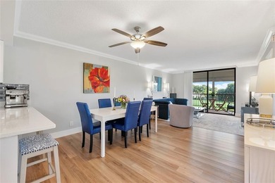 You'll fall in love with this move-in ready & beautifully on Hillsboro Pines Golf in Florida - for sale on GolfHomes.com, golf home, golf lot