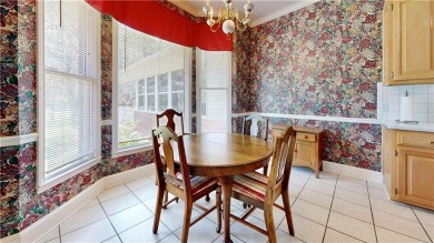 Imagine mornings on your spacious covered front porch or on Okefenokee Country Club in Georgia - for sale on GolfHomes.com, golf home, golf lot