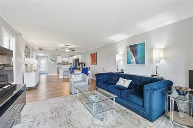 You'll fall in love with this move-in ready & beautifully on Hillsboro Pines Golf in Florida - for sale on GolfHomes.com, golf home, golf lot