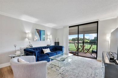 You'll fall in love with this move-in ready & beautifully on Hillsboro Pines Golf in Florida - for sale on GolfHomes.com, golf home, golf lot