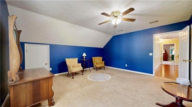 Imagine mornings on your spacious covered front porch or on Okefenokee Country Club in Georgia - for sale on GolfHomes.com, golf home, golf lot