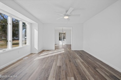 Situated on a quiet culdesac, this 3 bedroom, 2.5 bath home on Rock Creek Country Club in North Carolina - for sale on GolfHomes.com, golf home, golf lot