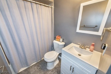 Completely updated and move-in ready, this stylish 2-bedroom on Minerals Golf Club in New Jersey - for sale on GolfHomes.com, golf home, golf lot