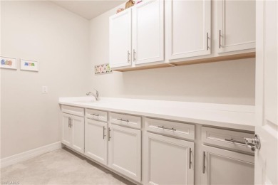 PRICE REDUCTION AND the sellers have just had the grout cleaned on River Hall Country Club in Florida - for sale on GolfHomes.com, golf home, golf lot