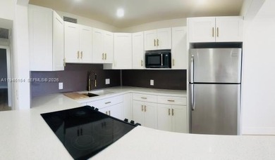 Enjoy this complete remodeled 2 bedroom, 1 and 1/2 bath condo on Flamingo Lakes Country Club in Florida - for sale on GolfHomes.com, golf home, golf lot