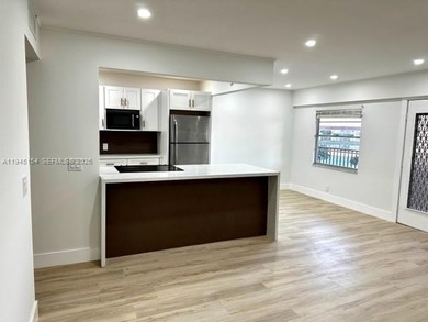 Enjoy this complete remodeled 2 bedroom, 1 and 1/2 bath condo on Flamingo Lakes Country Club in Florida - for sale on GolfHomes.com, golf home, golf lot