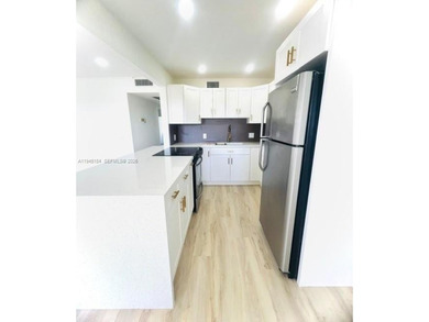 Enjoy this complete remodeled 2 bedroom, 1 and 1/2 bath condo on Flamingo Lakes Country Club in Florida - for sale on GolfHomes.com, golf home, golf lot