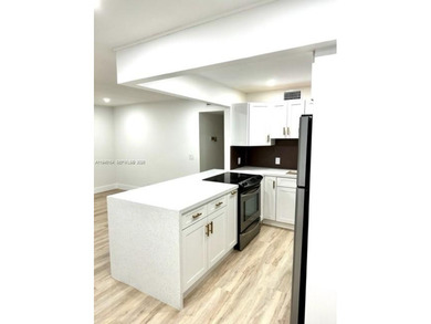 Enjoy this complete remodeled 2 bedroom, 1 and 1/2 bath condo on Flamingo Lakes Country Club in Florida - for sale on GolfHomes.com, golf home, golf lot