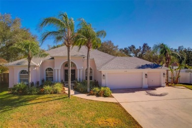 This stunning home has it all! With 4 bedrooms, 3 bathrooms, a on Bloomingdale Golfers Club in Florida - for sale on GolfHomes.com, golf home, golf lot