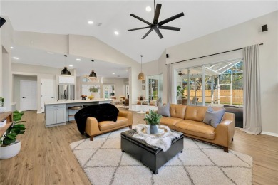 This stunning home has it all! With 4 bedrooms, 3 bathrooms, a on Bloomingdale Golfers Club in Florida - for sale on GolfHomes.com, golf home, golf lot