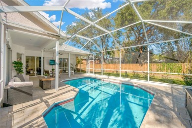 This stunning home has it all! With 4 bedrooms, 3 bathrooms, a on Bloomingdale Golfers Club in Florida - for sale on GolfHomes.com, golf home, golf lot