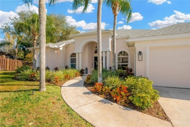 This stunning home has it all! With 4 bedrooms, 3 bathrooms, a on Bloomingdale Golfers Club in Florida - for sale on GolfHomes.com, golf home, golf lot