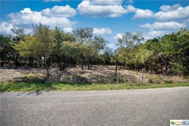 Tree shaded possible second story lake view lot located in on Canyon Lake Golf Club in Texas - for sale on GolfHomes.com, golf home, golf lot