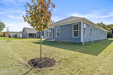 Welcome to the Boardwalk, a stylish, one-level home with modern on Sound Golf Links at Albemarle Plantation in North Carolina - for sale on GolfHomes.com, golf home, golf lot