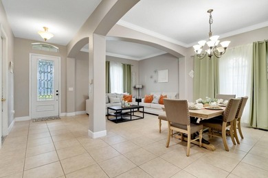 Welcome to this spacious and beautifully maintained home located on Kissimmee Bay Country Club in Florida - for sale on GolfHomes.com, golf home, golf lot