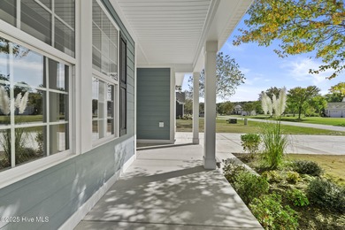 Welcome to the Boardwalk, a stylish, one-level home with modern on Sound Golf Links at Albemarle Plantation in North Carolina - for sale on GolfHomes.com, golf home, golf lot