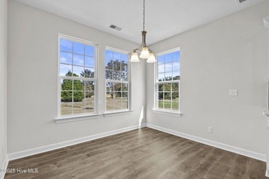 Welcome to the Boardwalk, a stylish, one-level home with modern on Sound Golf Links at Albemarle Plantation in North Carolina - for sale on GolfHomes.com, golf home, golf lot