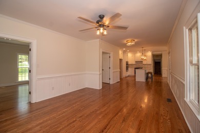 Welcome to this stunning brick home, thoughtfully renovated from on West Lake Country Club in Georgia - for sale on GolfHomes.com, golf home, golf lot