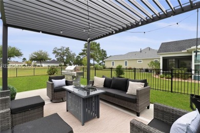 Southern charm  Lowcountry living merge in this beautifully on Hilton Head Lakes Golf Club in South Carolina - for sale on GolfHomes.com, golf home, golf lot