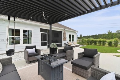 Southern charm  Lowcountry living merge in this beautifully on Hilton Head Lakes Golf Club in South Carolina - for sale on GolfHomes.com, golf home, golf lot