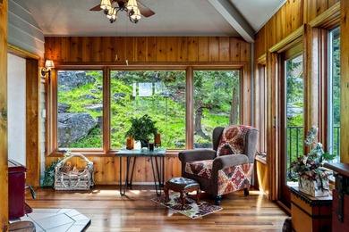 If you want beautiful Swan Mountain views from almost every room on  in Montana - for sale on GolfHomes.com, golf home, golf lot