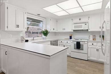 Enjoy golf course living in this beautifully remodeled one-level on Charbonneau Golf Club in Oregon - for sale on GolfHomes.com, golf home, golf lot